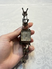 A Chinese enamelled silver model of four bearers and a silver model of a bearer, Guang Sheng Yuan 廣生源 and Yan Ji 衍記 mark, 19th C.