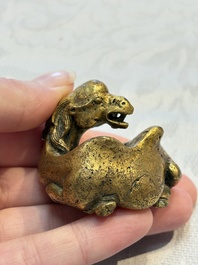 A Chinese gilt bronze 'Camel' paper weight, 19th C.