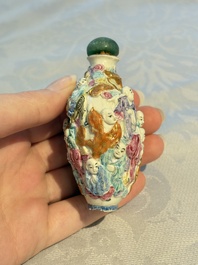 Four Chinese famille rose moulded 'Luohan' snuff bottles, Qianlong marks, 19th C.