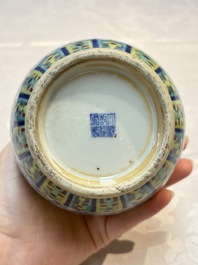 A pair of Chinese doucai 'Hu' vases with lotus scroll design, Qianlong mark, 19th C.