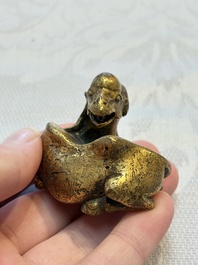 A Chinese gilt bronze 'Camel' paper weight, 19th C.