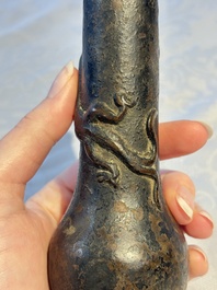 A small Chinese bronze vase with a chilong on a wooden stand, Yuan