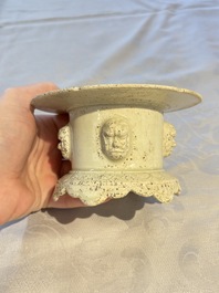 A Chinese qingbai censer with masks in relief, 20th C