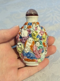 Four Chinese famille rose moulded 'Luohan' snuff bottles, Qianlong marks, 19th C.