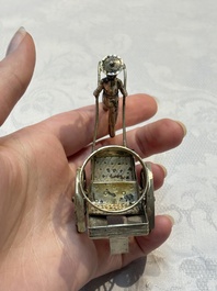 A Chinese enamelled silver model of four bearers and a silver model of a bearer, Guang Sheng Yuan 廣生源 and Yan Ji 衍記 mark, 19th C.