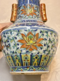 A pair of Chinese doucai 'Hu' vases with lotus scroll design, Qianlong mark, 19th C.