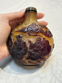 A very large Chinese brown-overlay amber glass 'Ba Xian Zhu Shou 八仙祝壽&lsquo; table snuff bottle, 19th C.