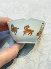 Three fine Chinese eggshell iron-red and gilt-decorated 'Boy and Goats' cups and saucers, Yongzheng