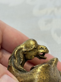 A Chinese gilt bronze 'Camel' paper weight, 19th C.