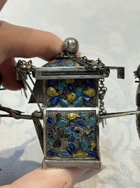 A Chinese enamelled silver model of four bearers and a silver model of a bearer, Guang Sheng Yuan 廣生源 and Yan Ji 衍記 mark, 19th C.