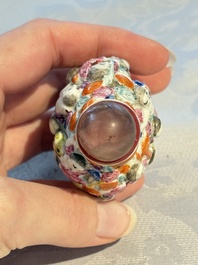 Four Chinese famille rose moulded 'Luohan' snuff bottles, Qianlong marks, 19th C.