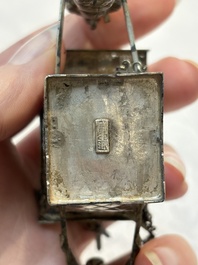 A Chinese enamelled silver model of four bearers and a silver model of a bearer, Guang Sheng Yuan 廣生源 and Yan Ji 衍記 mark, 19th C.