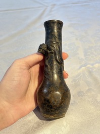 A small Chinese bronze vase with a chilong on a wooden stand, Yuan