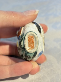 Four Chinese famille rose moulded 'Luohan' snuff bottles, Qianlong marks, 19th C.