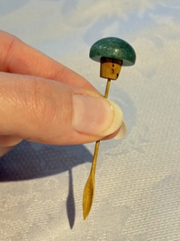 Four Chinese famille rose moulded 'Luohan' snuff bottles, Qianlong marks, 19th C.