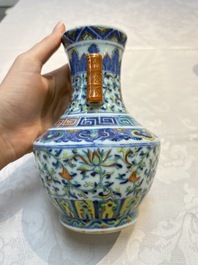 A pair of Chinese doucai 'Hu' vases with lotus scroll design, Qianlong mark, 19th C.