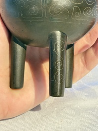 A Chinese silver-inlaid bronze tripod censer with clouds design, 19th C.