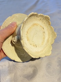 A Chinese qingbai censer with masks in relief, 20th C