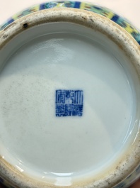 A pair of Chinese doucai 'Hu' vases with lotus scroll design, Qianlong mark, 19th C.