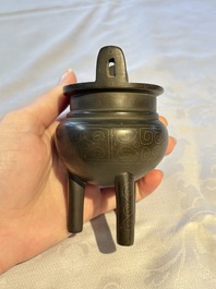 A Chinese silver-inlaid bronze tripod censer with clouds design, 19th C.