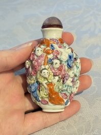 Four Chinese famille rose moulded 'Luohan' snuff bottles, Qianlong marks, 19th C.