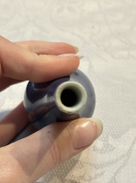 A pair of Chinese blue-glazed 'Hatcher Cargo' vases with incised dragons and a stem cup, Transitional period