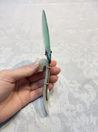 A Chinese mounted magnifying glass with a jade handle and a sterling silver letter opener with a jade handle, 19th C.