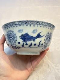 Three Chinese blue and white 'Fish' bowls and a bottle vase, Kangxi marks, 19th C.