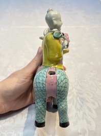 A pair of Chinese famille rose models of a boy riding a qilin and a bitong, 19/20th C.