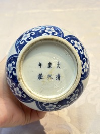 Three Chinese blue and white 'Fish' bowls and a bottle vase, Kangxi marks, 19th C.