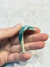 A pair of Chinese famille rose models of a boy riding a qilin and a bitong, 19/20th C.