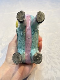 A pair of Chinese famille rose models of a boy riding a qilin and a bitong, 19/20th C.