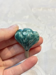 A pair of Chinese famille rose models of a boy riding a qilin and a bitong, 19/20th C.