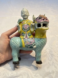 A pair of Chinese famille rose models of a boy riding a qilin and a bitong, 19/20th C.