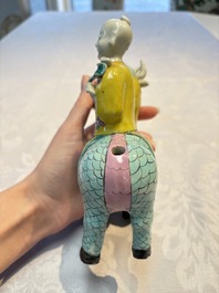 A pair of Chinese famille rose models of a boy riding a qilin and a bitong, 19/20th C.