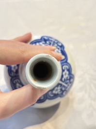Three Chinese blue and white 'Fish' bowls and a bottle vase, Kangxi marks, 19th C.