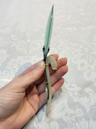 A Chinese mounted magnifying glass with a jade handle and a sterling silver letter opener with a jade handle, 19th C.