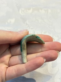 A pair of Chinese famille rose models of a boy riding a qilin and a bitong, 19/20th C.