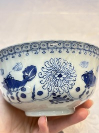 Three Chinese blue and white 'Fish' bowls and a bottle vase, Kangxi marks, 19th C.