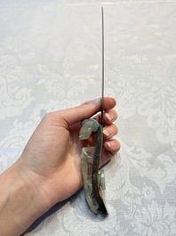 A Chinese mounted magnifying glass with a jade handle and a sterling silver letter opener with a jade handle, 19th C.