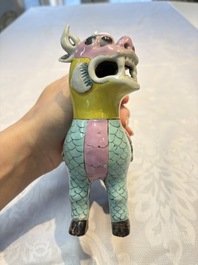 A pair of Chinese famille rose models of a boy riding a qilin and a bitong, 19/20th C.