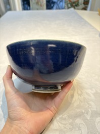 A pair of Chinese blue-glazed 'Hatcher Cargo' bowls with incised dragons, Transitional period