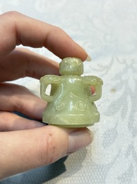 A Chinese celadon jade covered vase, with wooden stand, and a bowl with wooden cover and stand, 19/20th C.