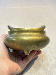 Two Chinese bronze tripod censers, Xuande and double-vajra mark, 19th C.