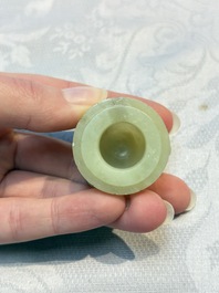 A Chinese celadon jade covered vase, with wooden stand, and a bowl with wooden cover and stand, 19/20th C.