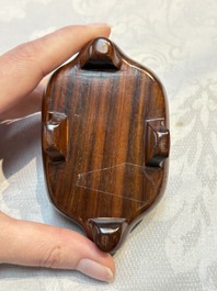 A Chinese famille rose ewer in the form of a dragon and two carps with wooden cover and stand, 19th C.