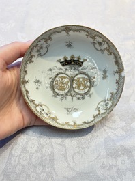 Four sets of Chinese export grisaille and gilt-decorated handled cups and saucers with crowned monograms, Qianlong