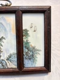 A set of four Chinese famille rose 'Landscape' plaques mounted in a wooden frame, signed Wang Yunquan 王雲泉, together with four plaques, 20th C.