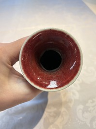 A Chinese blue-glazed jar and a flamb&eacute;-glazed vase, 19/20th C.