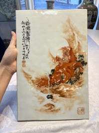 A fine Chinese iron-red and grisaille 'Luohan' plaque, signed Wang Bu 王步, 20th C.